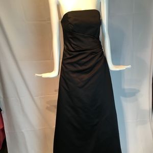 black floor length strapless gown by Davids Bridal